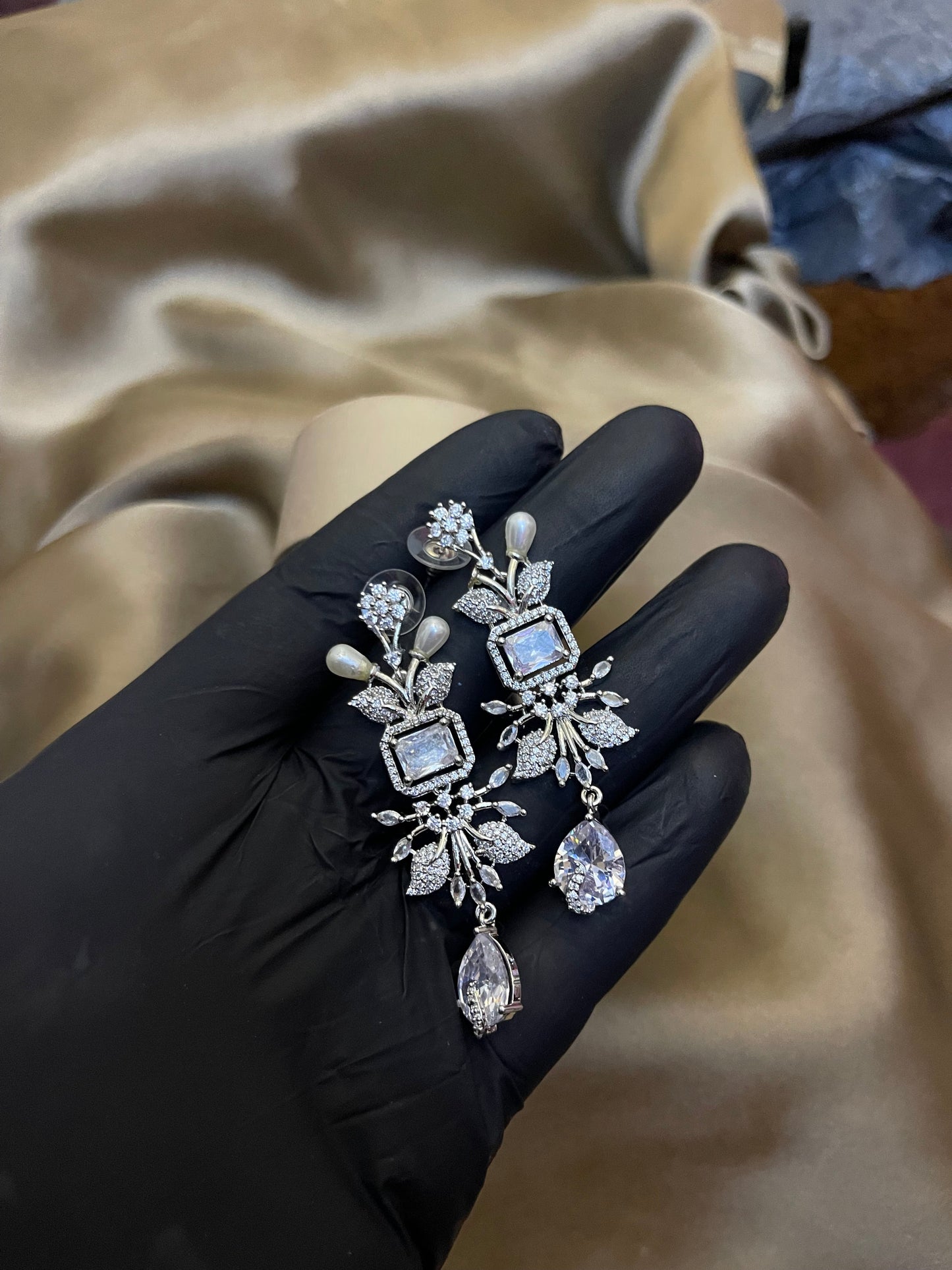 Zircon Ad Earrings